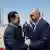 Turkish President Recep Tayyip Erdogan shaking hands with Iraqi Prime Minister Mohammed Shia al-Sudani 